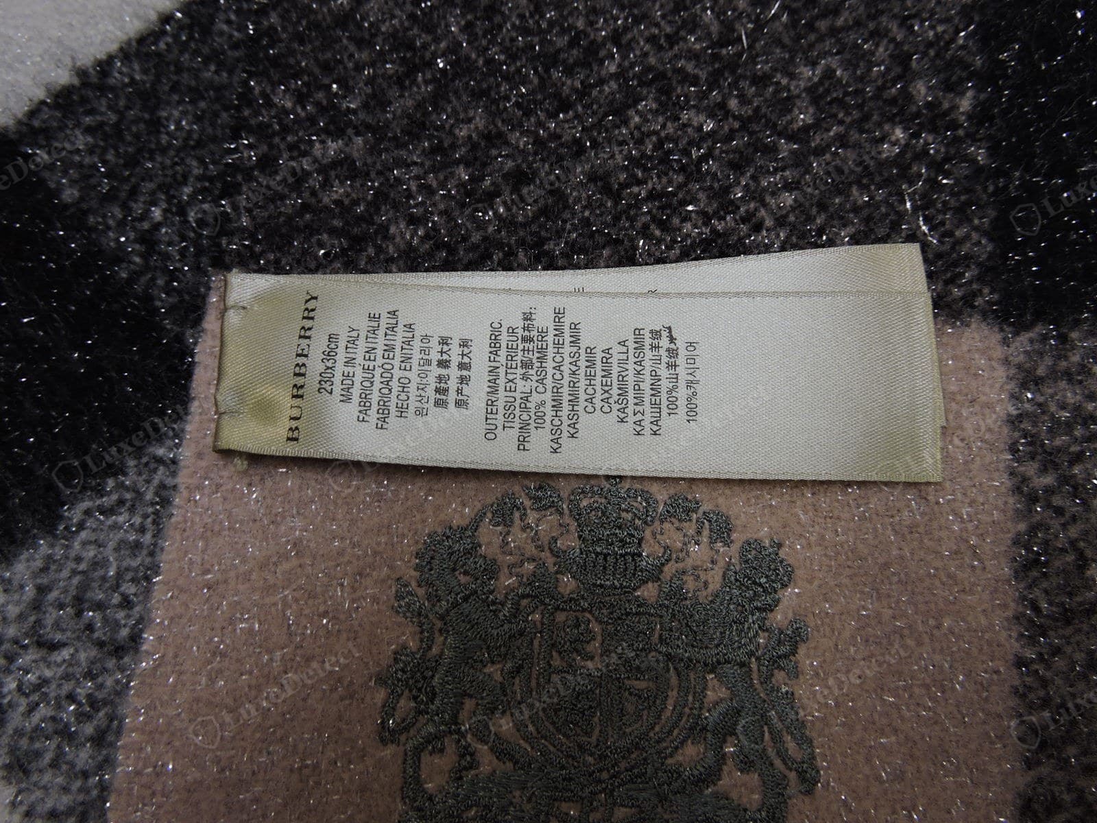 Genuine Burberry scarf care label — correct cashmere/wool content, care symbols, and a valid RN number, cleanly finished
