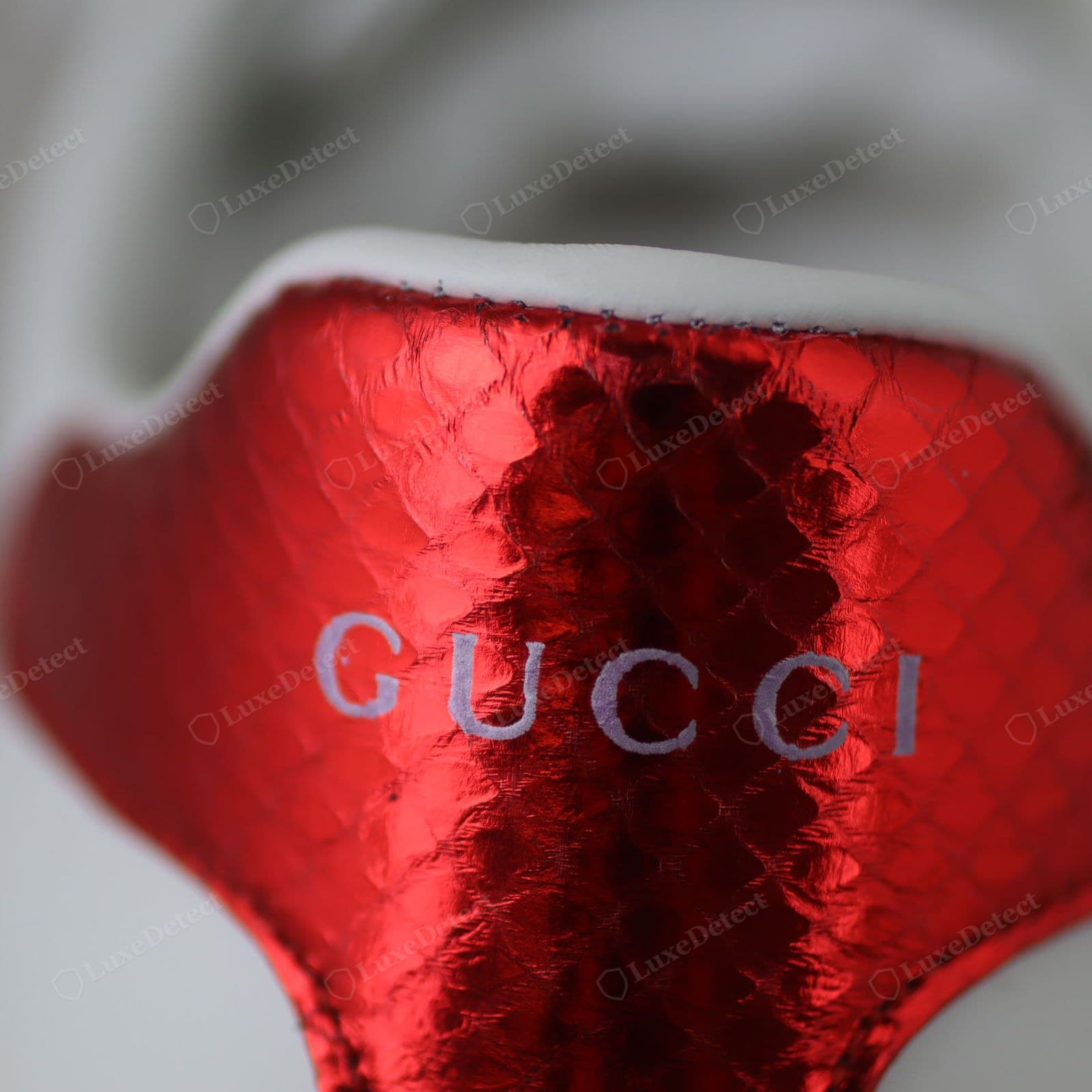 Genuine Gucci Ace heel logo — the "GUCCI" on the outer heel counter cleanly applied, correctly proportioned