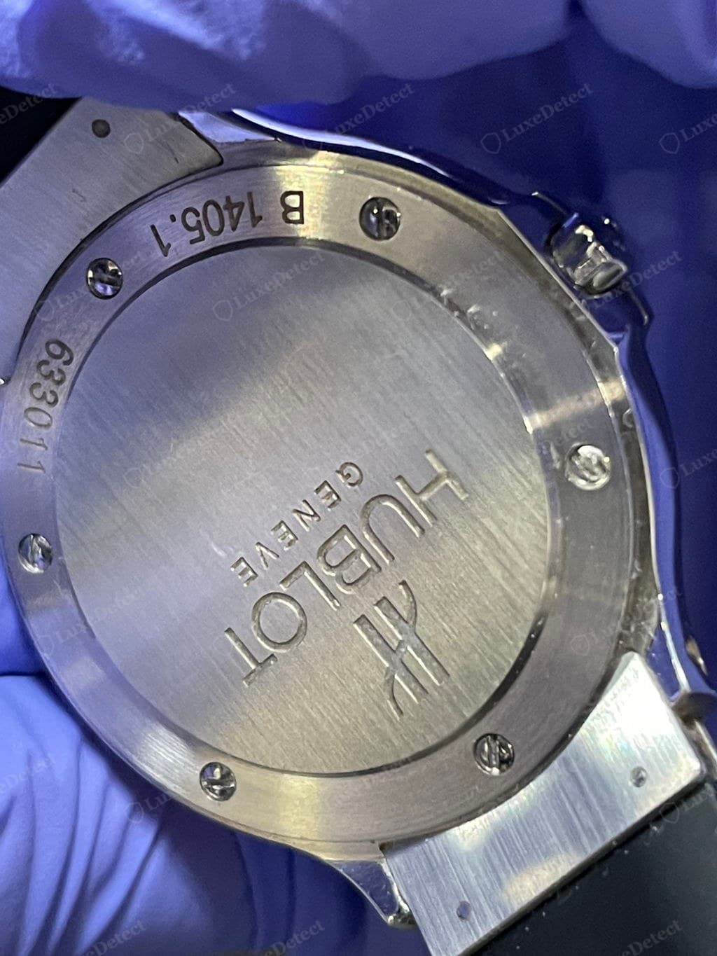 Genuine Hublot caseback — deep, crisp reference and serial engraving, bezel screws clocked consistently