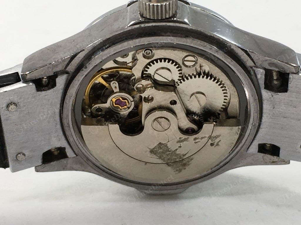Counterfeit Hublot movement — generic rotor, printed or absent logo, a plain calibre where a UNICO column wheel should be