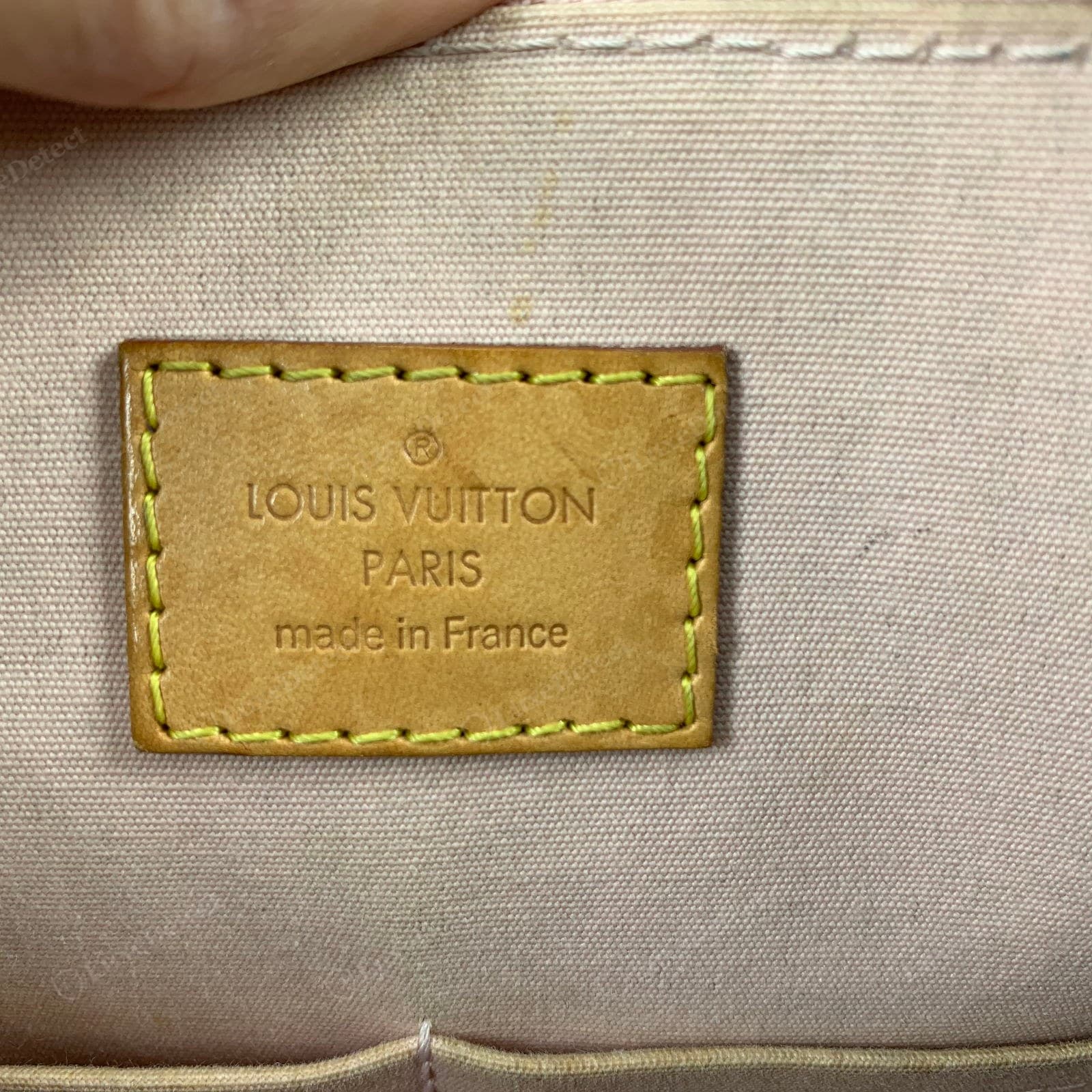 Genuine LV Alma heat stamp — "LOUIS VUITTON" over "made in France", round Os, close T tops, even shallow press