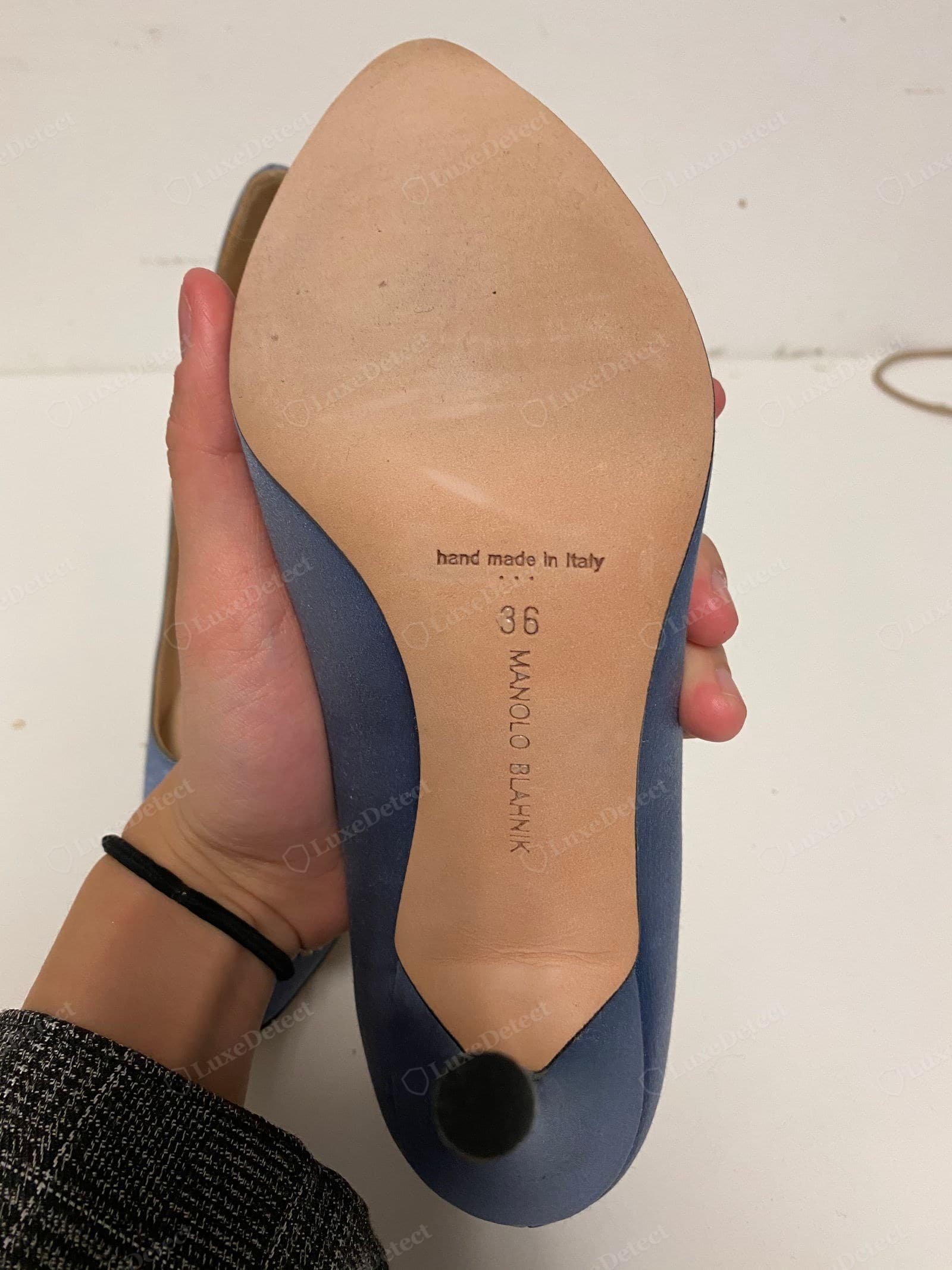 Genuine Manolo Blahnik sole — "hand made in Italy" with the three-dot motif, the size "36", and "MANOLO BLAHNIK" in the correct evenly spaced sans-serif, stamped cleanly into a tan leather sole