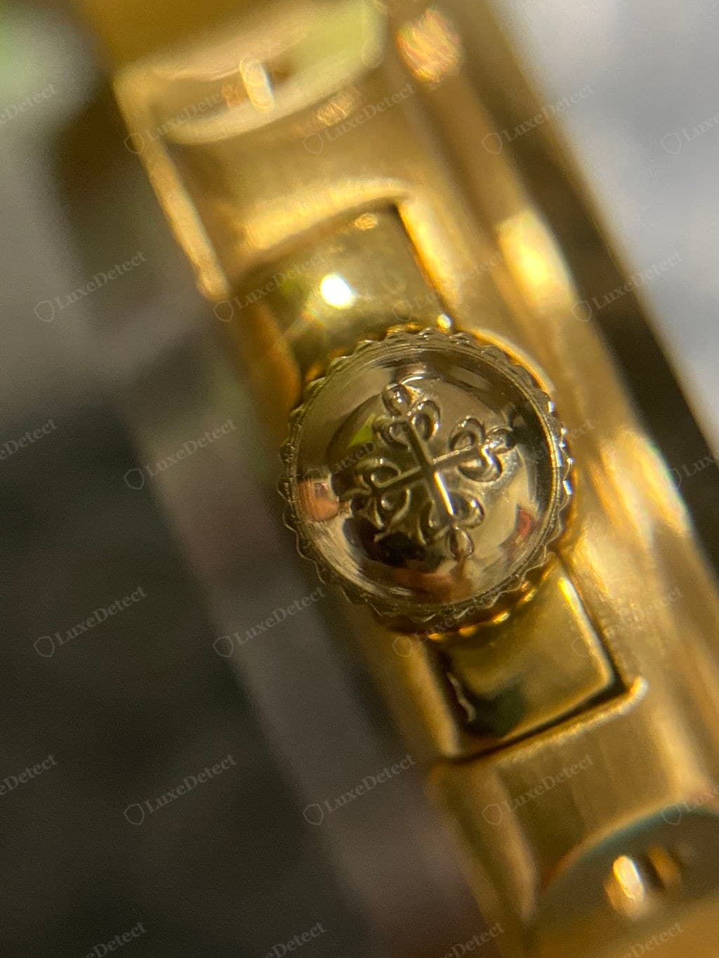 Counterfeit Patek Philippe — dial, hands and crown detail that miss the genuine finishing