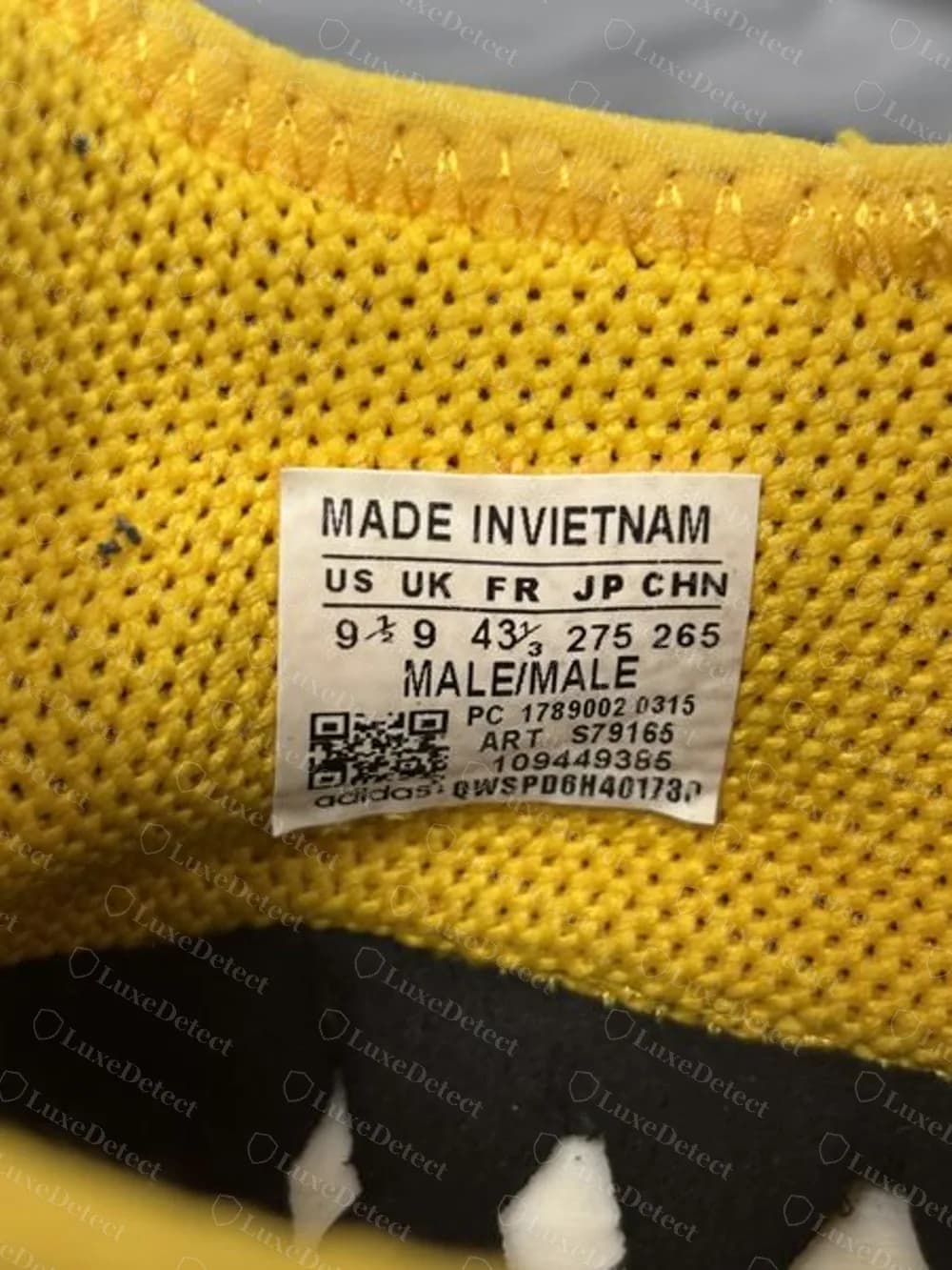 Counterfeit Hu NMD label with MADE INVIETNAM run together, PC 1789002 0315, article S79165