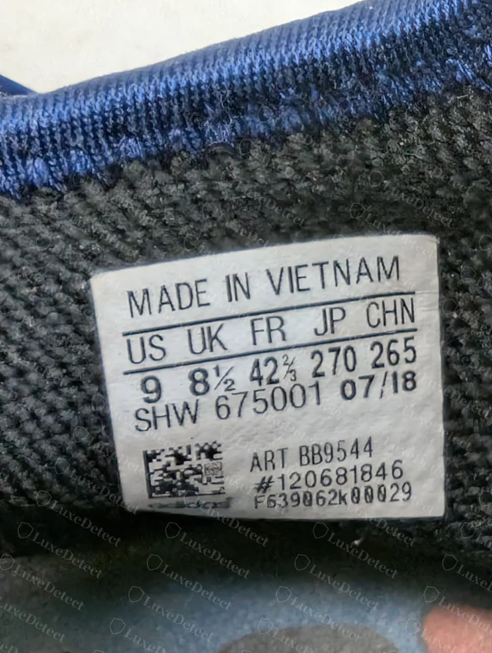 Etiqueta de unas Billionaire Boys Club Hu NMD originales con SHW 675001 07/18 y artículo BB9544