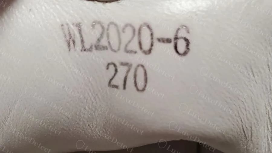 Counterfeit heel stamp reading WL2020-6 with the size given as 270: a letters-and-hyphen factory code with a millimetre size