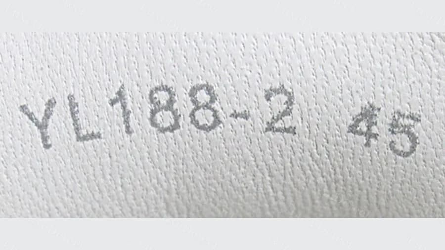 Counterfeit heel stamp reading YL188-2 followed by 45: a factory-style code, not a six-digit style number