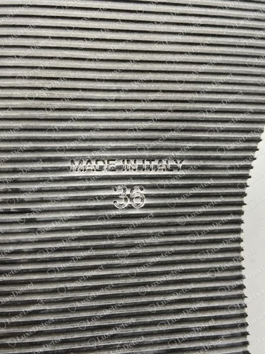 Genuine Ann Demeulemeester suede high-top, ribbed black rubber sole with MADE IN ITALY and the size 36 pressed in capitals
