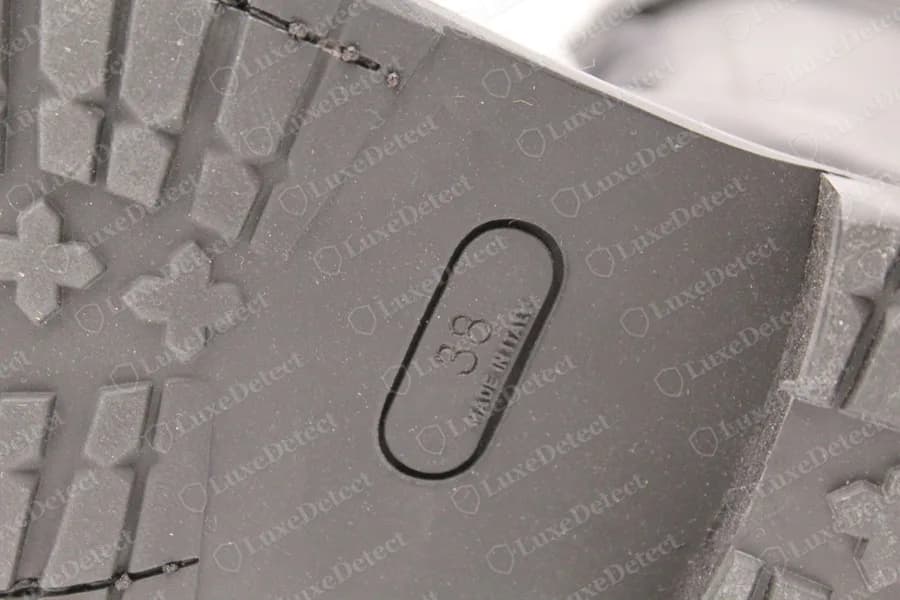 Genuine Ann Demeulemeester lace-up boot, rubber lug sole with an oval outline stamped with the size and small lettering beside it