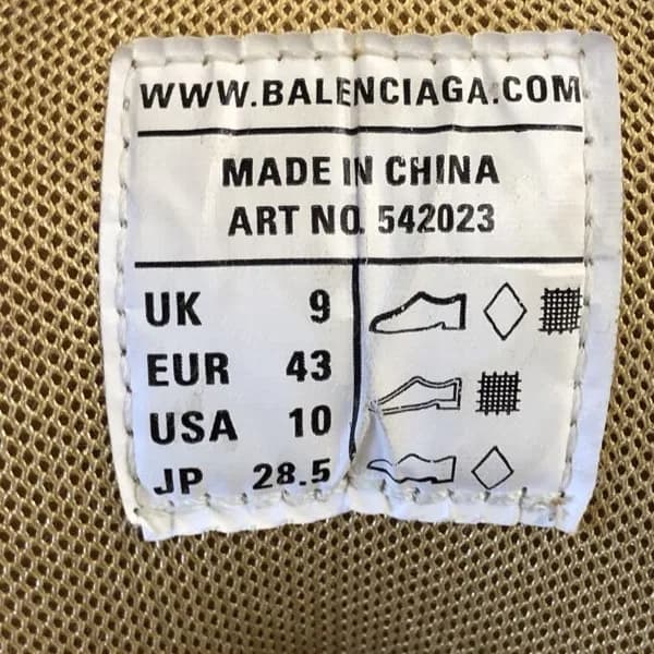 Genuine Balenciaga Track tongue label reading WWW.BALENCIAGA.COM, MADE IN CHINA, ART NO. 542023, with UK 9, EUR 43, USA 10 and JP 28.5 beside small icons