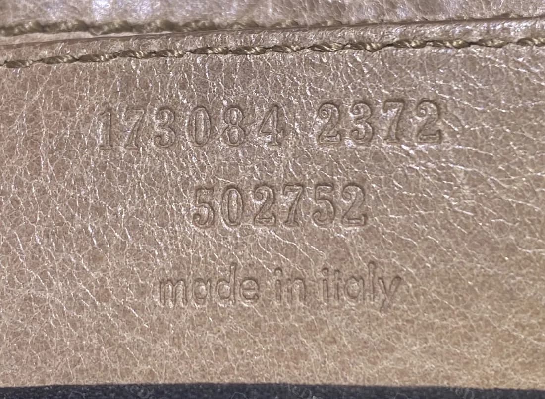 Older genuine City tab, blind-embossed with a six-digit style number and a four-digit group, a second six-digit number below and "made in italy" in lower case