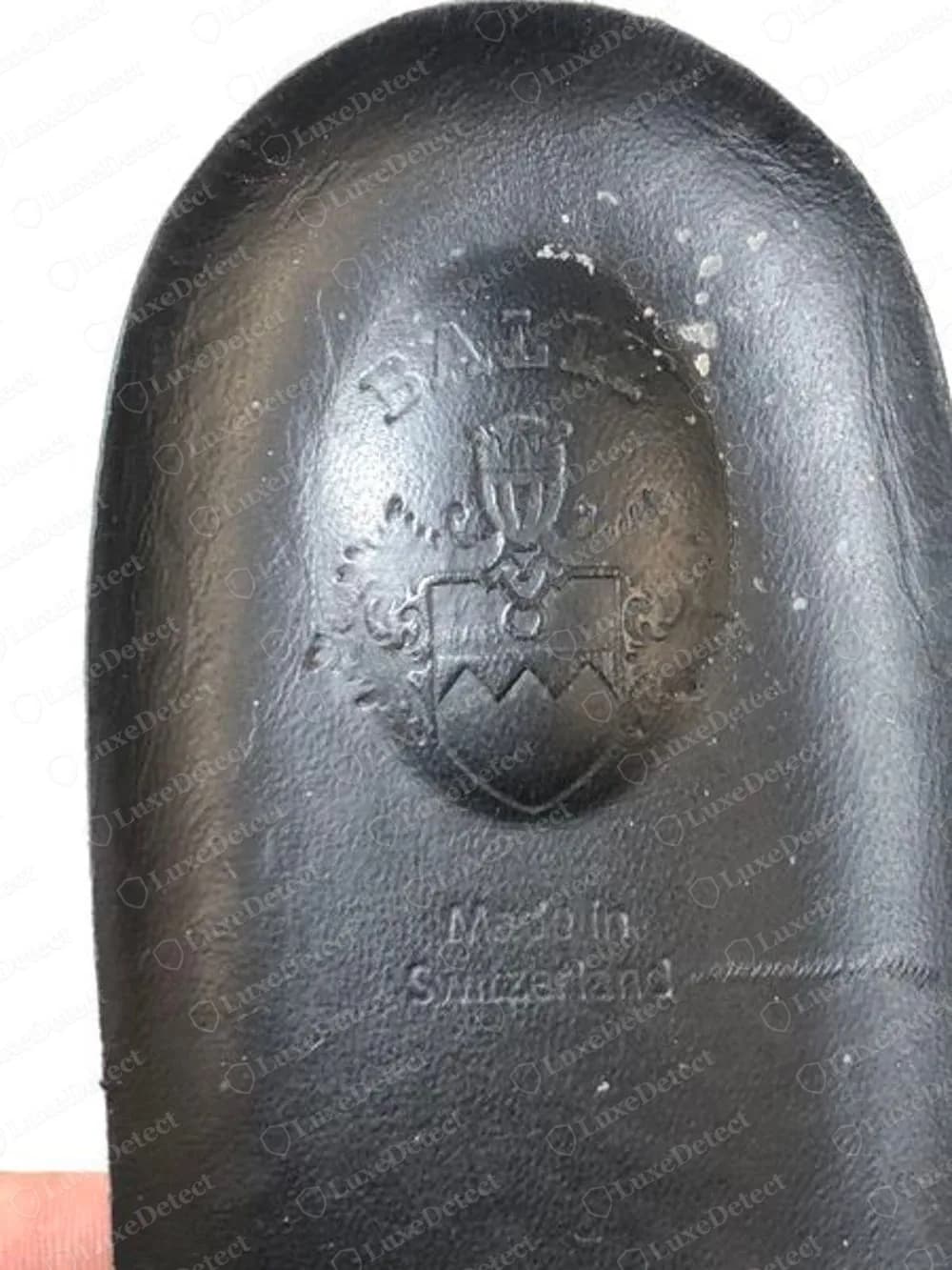 Genuine Bally insole heel with a pressed oval crest showing a shield and the name BALLY, with Made in Switzerland beneath