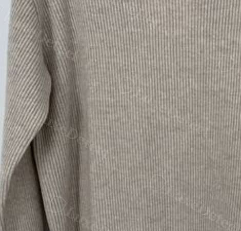 Counterfeit knit, a coarser rib with visible bulk between the ridges