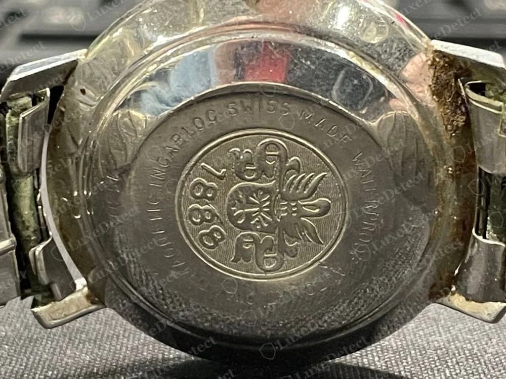 Genuine Bucherer automatic case back with a round crest and the year 1888 at the centre, ringed by engraved text that includes INCABLOC, SWISS MADE and WATERPROOF