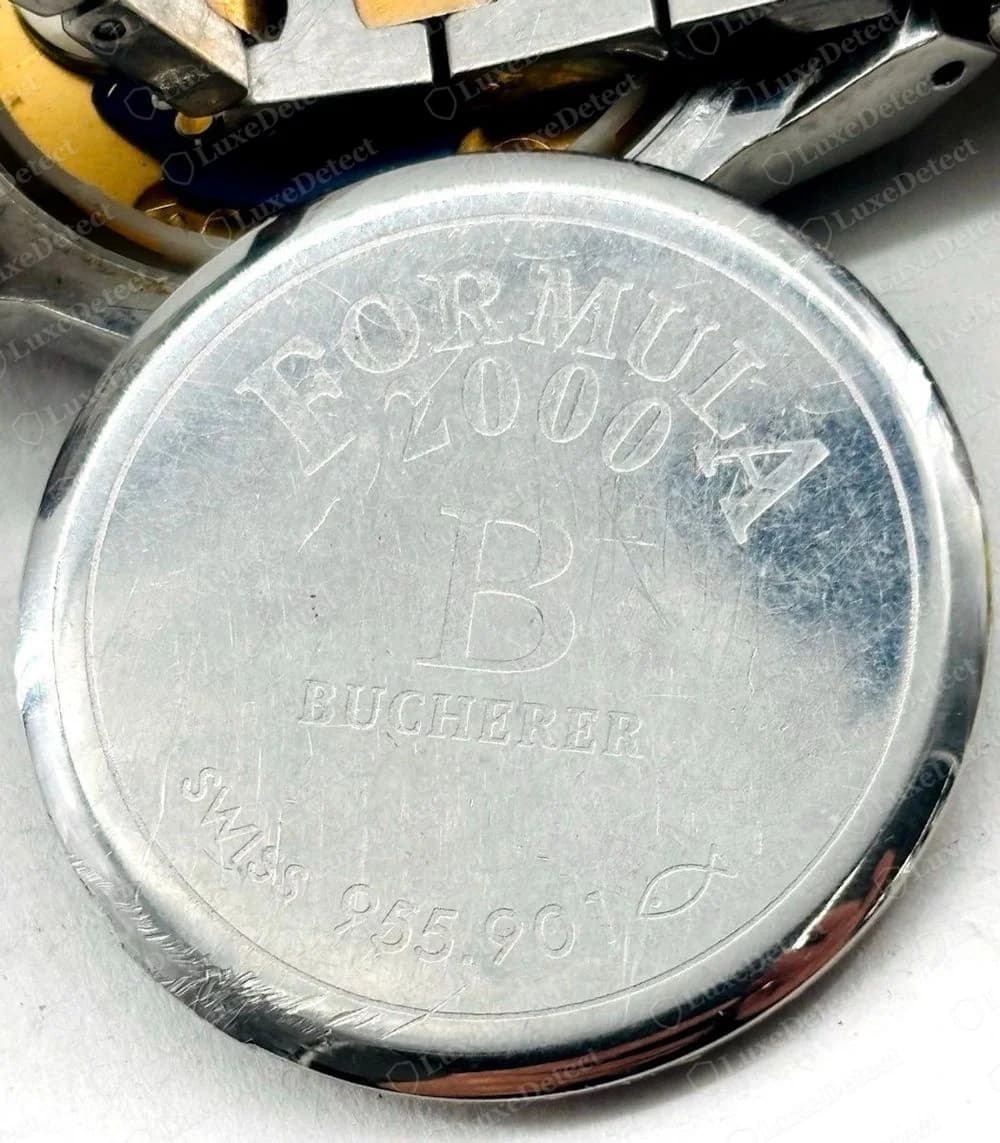 Genuine Bucherer Formula 2000 case back engraved FORMULA 2000 around the top, a large B, the name BUCHERER beneath it, then SWISS and a number along the lower edge