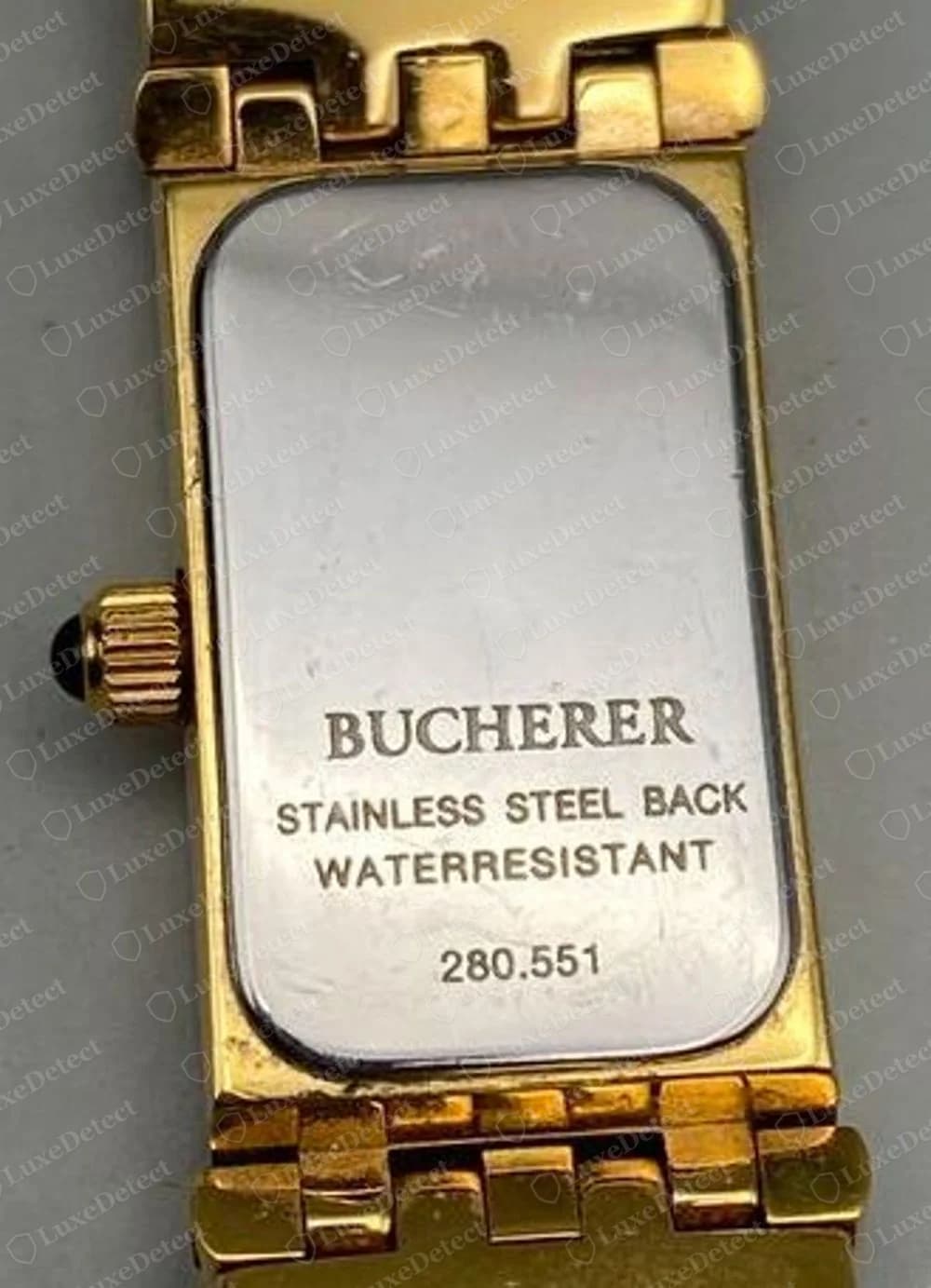 Genuine rectangular Bucherer case back reading BUCHERER, STAINLESS STEEL BACK and WATERRESISTANT, with the number 280.551 beneath