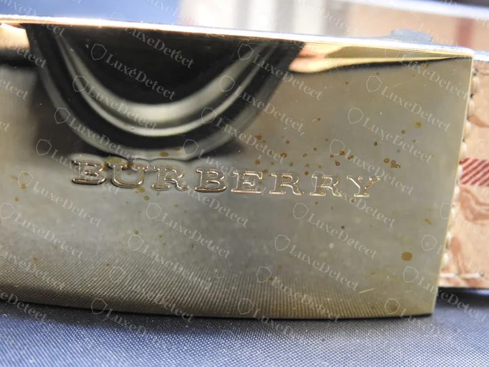 Authentic gold plaque buckle with BURBERRY engraved in clean capital letters