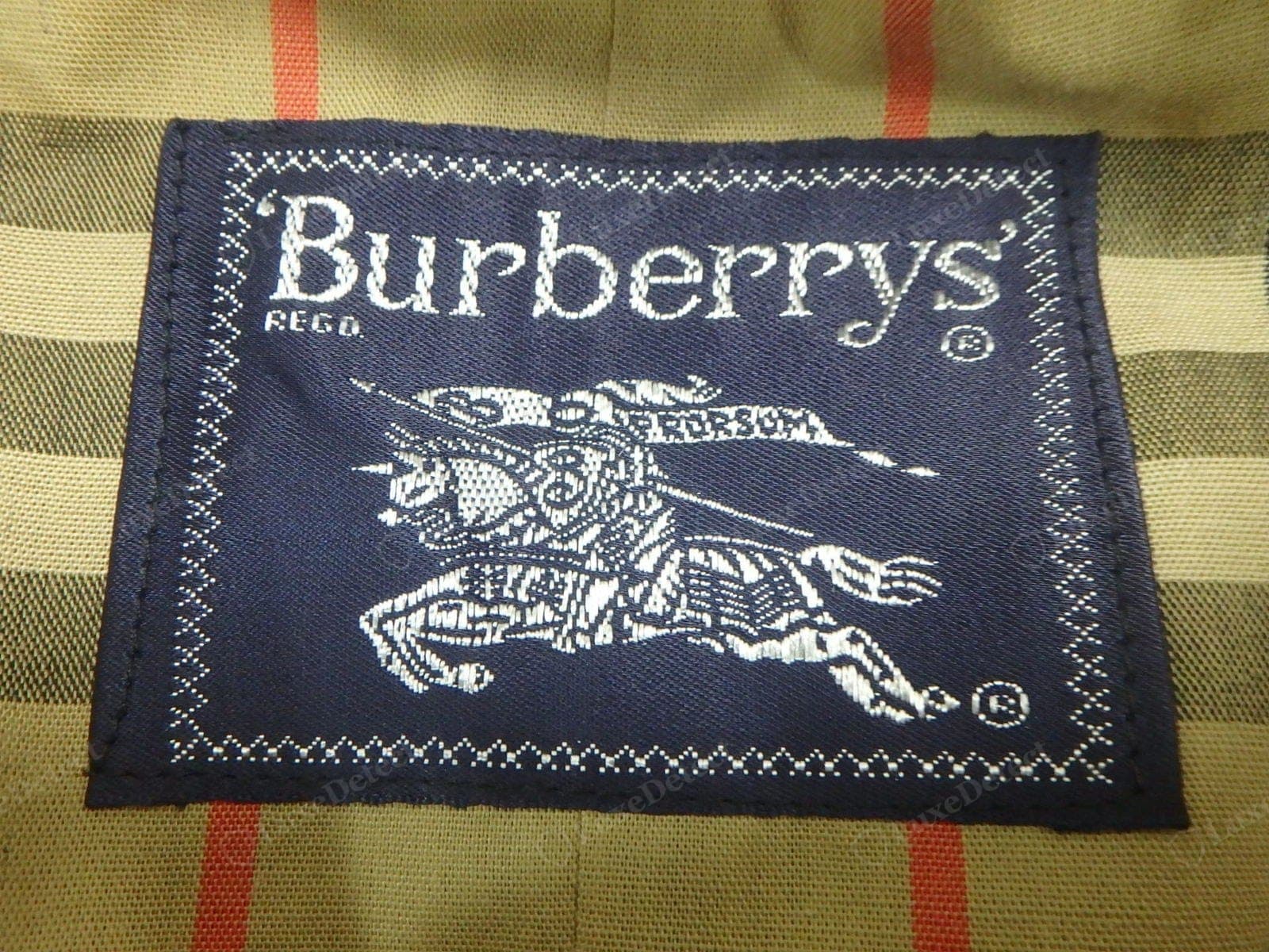 Genuine vintage Burberry label — the older "Burberrys" (with the S) label styling, cleanly woven, consistent with the coat's era