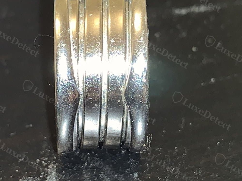 Authentic spiral bands: crisp, evenly spaced gaps between each loop with a consistent mirror finish.