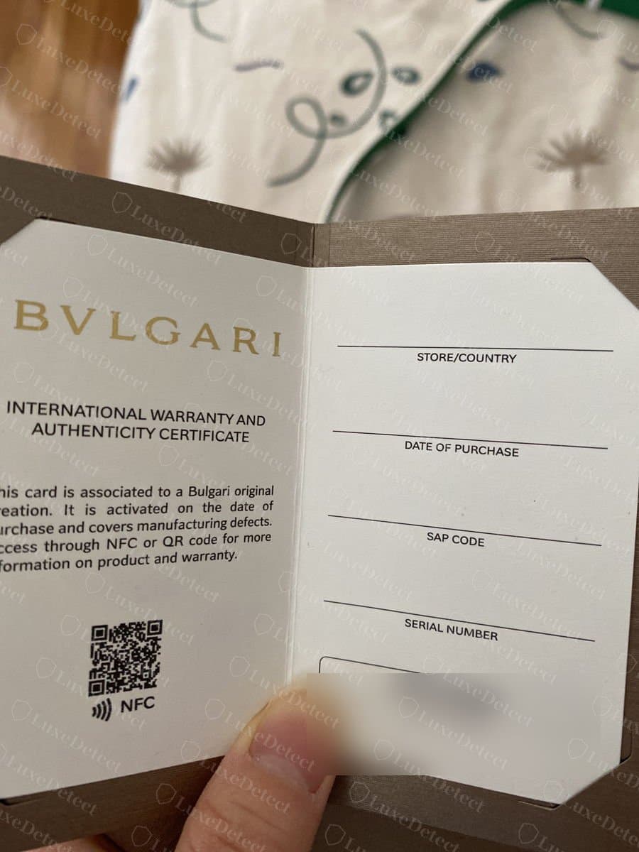 Genuine Bvlgari International Warranty and Authenticity Certificate card, with its QR code and NFC symbol and a serial number field