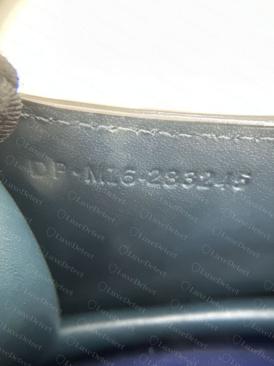 Genuine Bvlgari bag serial embossed into an interior pocket lining, in three parts: DP-M16-283245