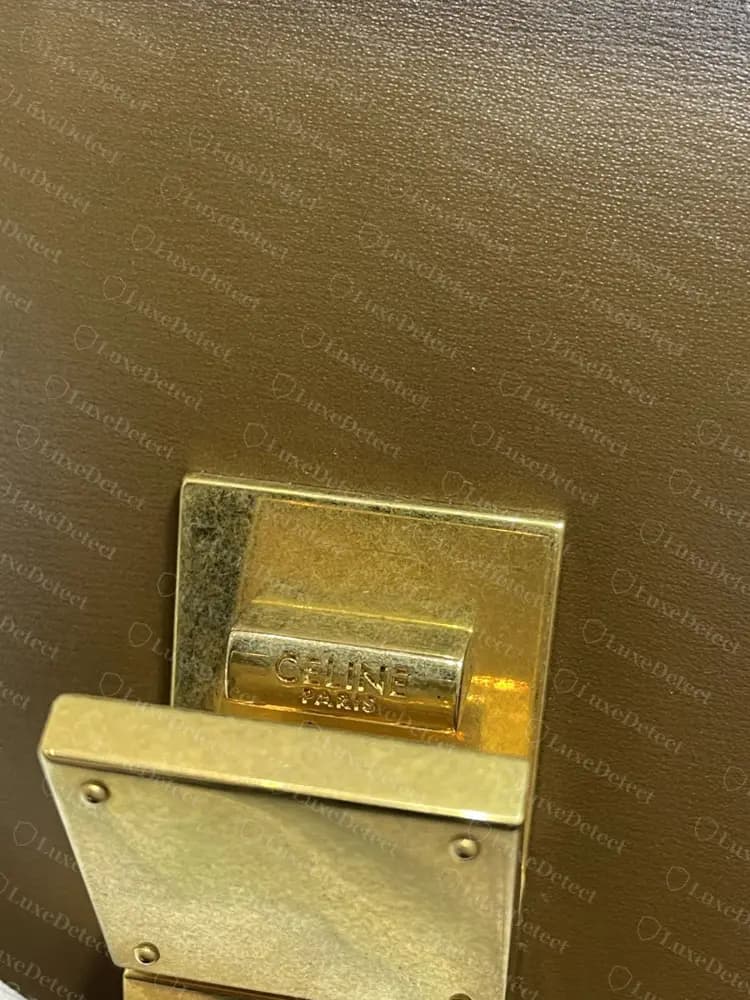 Authentic post-2018 clasp tongue, engraved CELINE over a smaller PARIS on two lines.