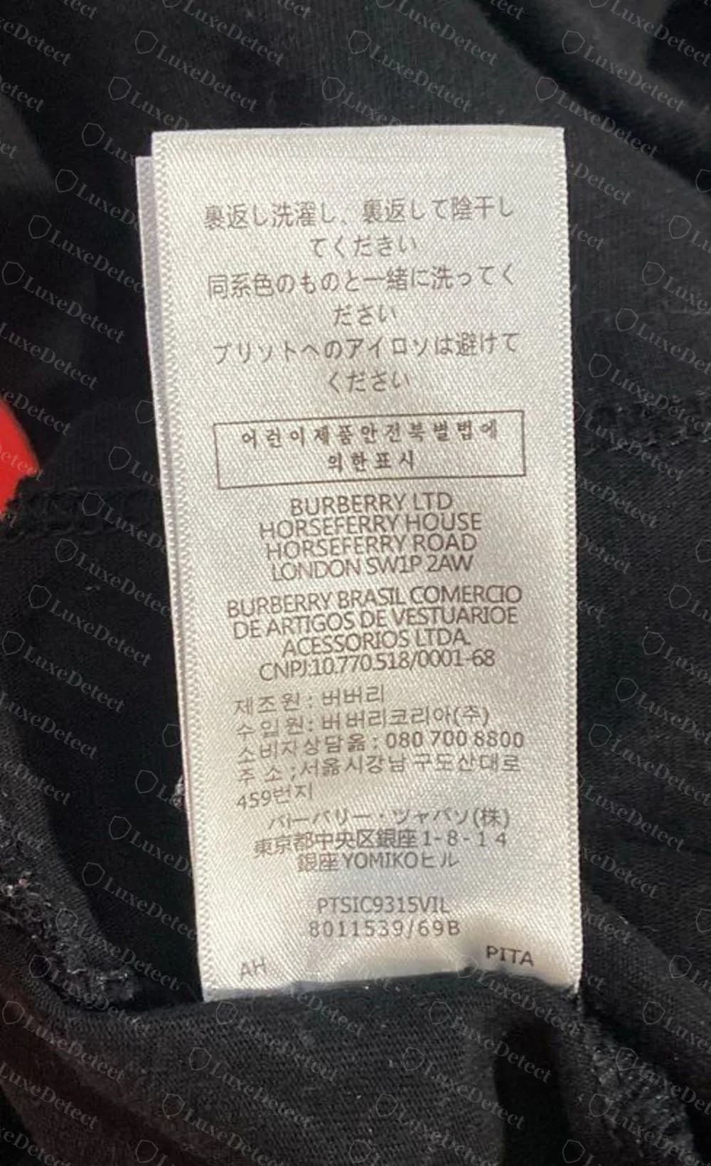 Counterfeit Celine T-shirt: a care label with Japanese, Korean and Portuguese text that names Burberry Ltd, Burberry Brasil and Burberry Japan