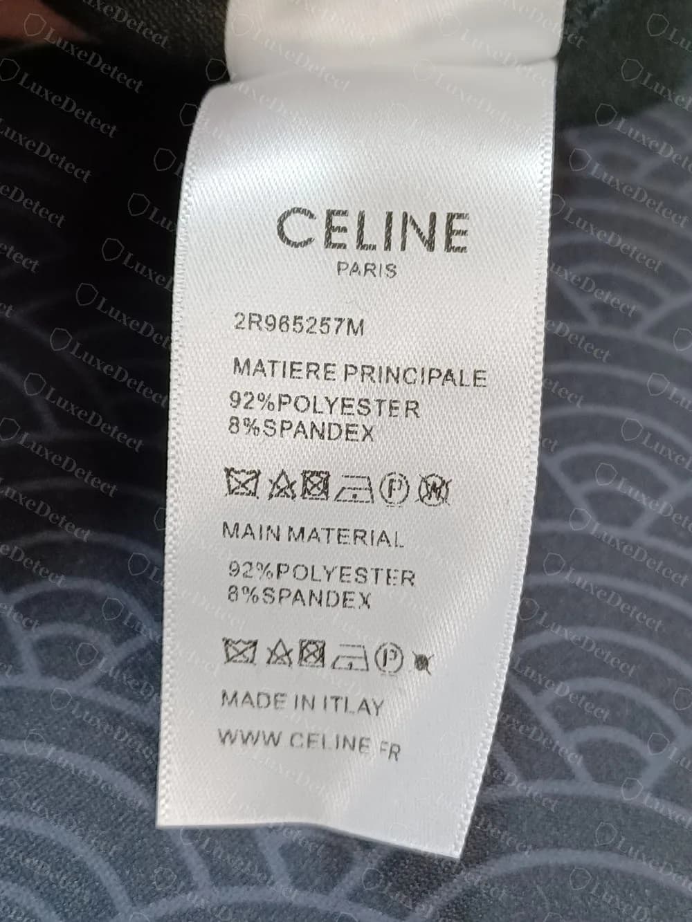 Counterfeit Celine care label: style code 2R965257M, MATIERE PRINCIPALE 92% polyester 8% spandex, and the spelling error MADE IN ITLAY