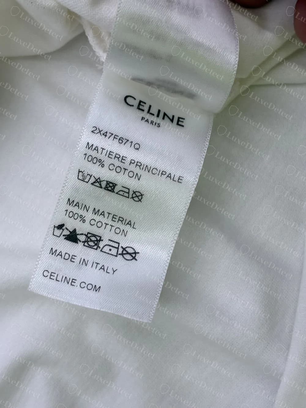 Etiqueta de cuidado original de la época de Slimane: CELINE PARIS, código de estilo 2X47F671Q, MATIERE PRINCIPALE y MAIN MATERIAL 100% algodón, Made in Italy y CELINE.COM