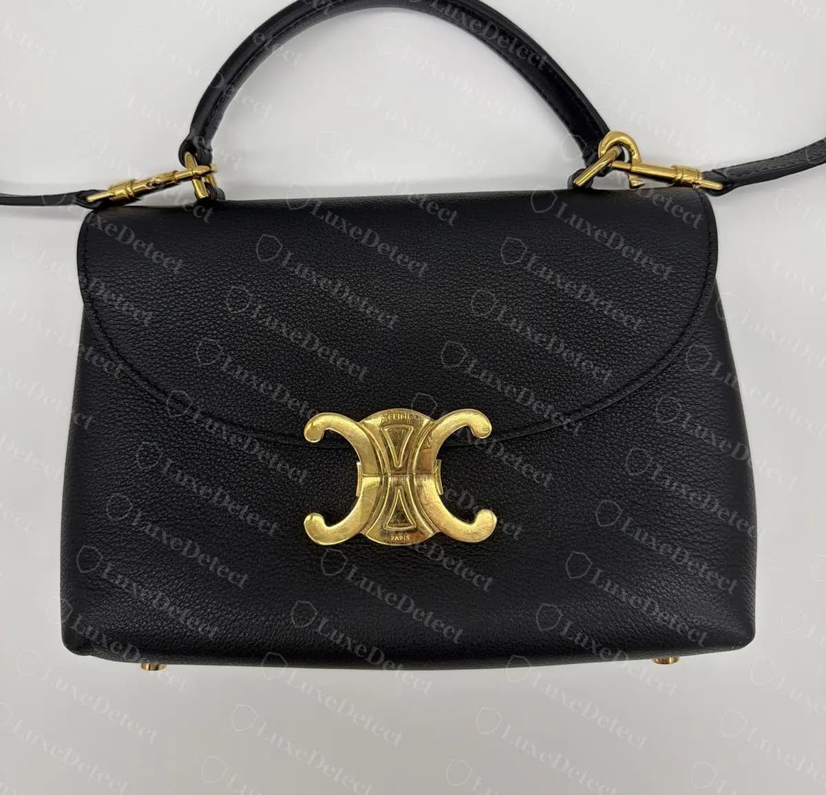 The same counterfeit from the front: at normal viewing distance the clasp outline, colour and placement all look right.