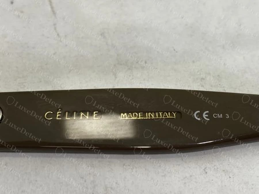 Authentic Safilo-era Celine temple: CÉLINE, the boxed MADE IN ITALY, then CE and the lens code CM 3.