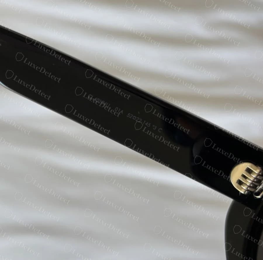 Authentic Triomphe 01 model print: CL40194U, colour code 01A, then 52□22-145 and the lens category.