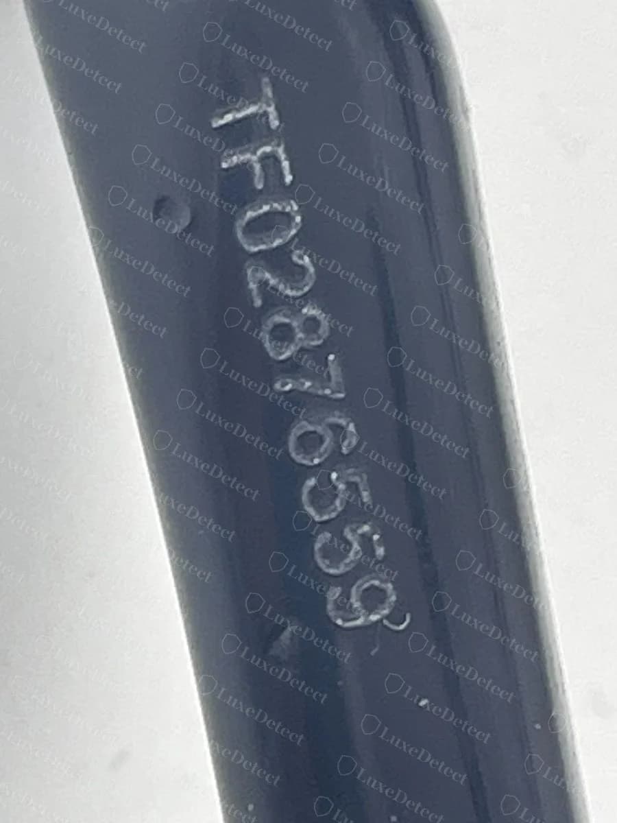 Authentic Celine temple tip with a laser-etched TF serial.