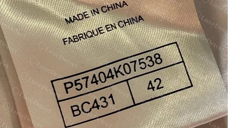 Fake Chanel style label with a boxed P-code, Made in China and the misspelt French Fabrique en China