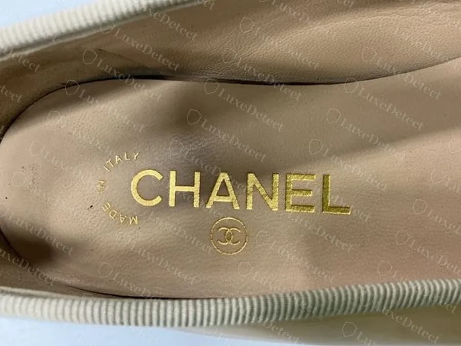 Authentic Chanel cap-toe ballet flat insole with a gold MADE IN ITALY arc, CHANEL and the CC roundel