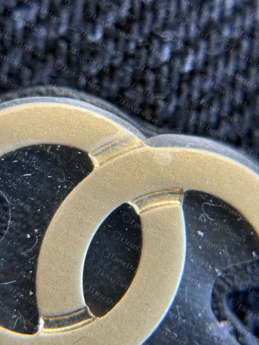Genuine Chanel interlocking CC hardware, cleanly cast with even stroke width and a smooth unblemished finish