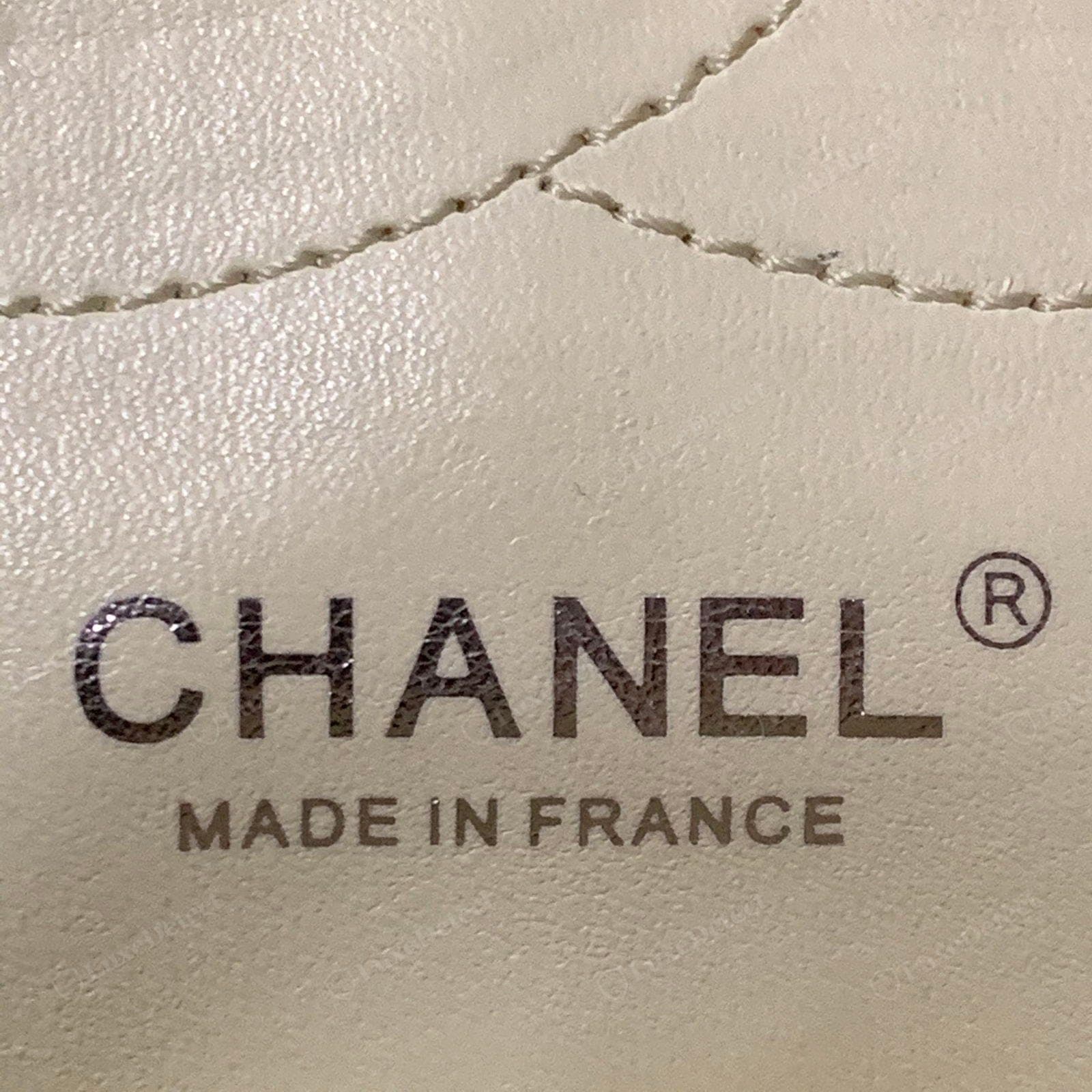Counterfeit Chanel origin mark — wrong font or spacing, an uneven or crooked stamp, or an origin other than France or Italy