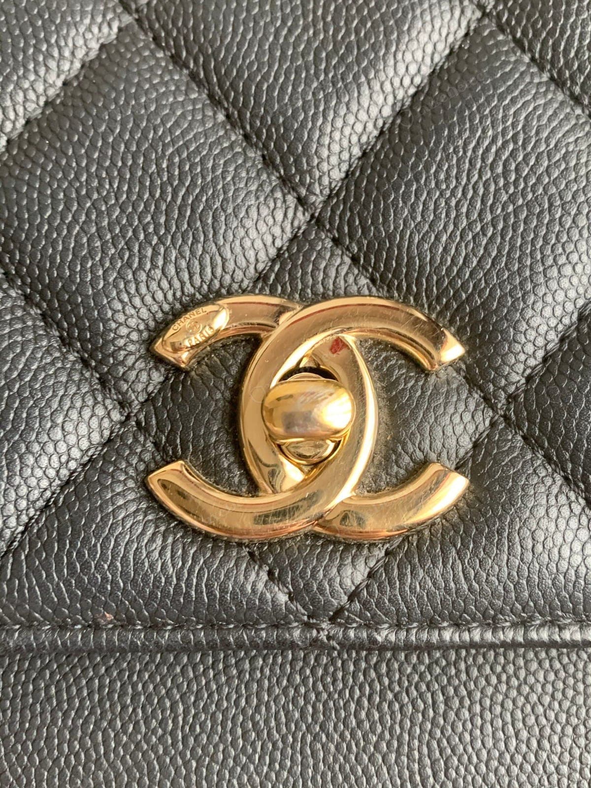 Counterfeit Chanel quilting — diamonds that vary in size, quilt lines that drift or mismatch at the seams