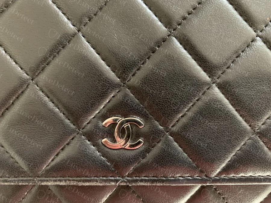Authentic Chanel wallet quilting — fine, recessed tonal stitching sitting in a groove between diamonds, small evenly plated CC hardware