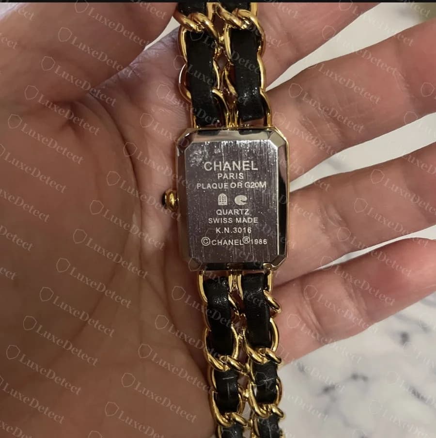 That fake's caseback: correctly formatted and close to the genuine layout, which is exactly the caveat above, a properly formatted caseback doesn't clear a Première on its own.