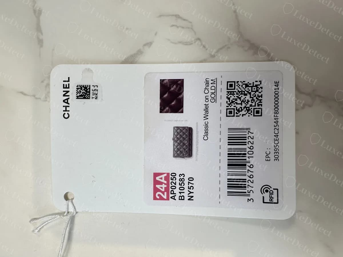 Genuine Chanel hang tag on a new Classic Wallet on Chain, showing the model name, a 24A season code, reference numbers, a QR code and an RFID mark
