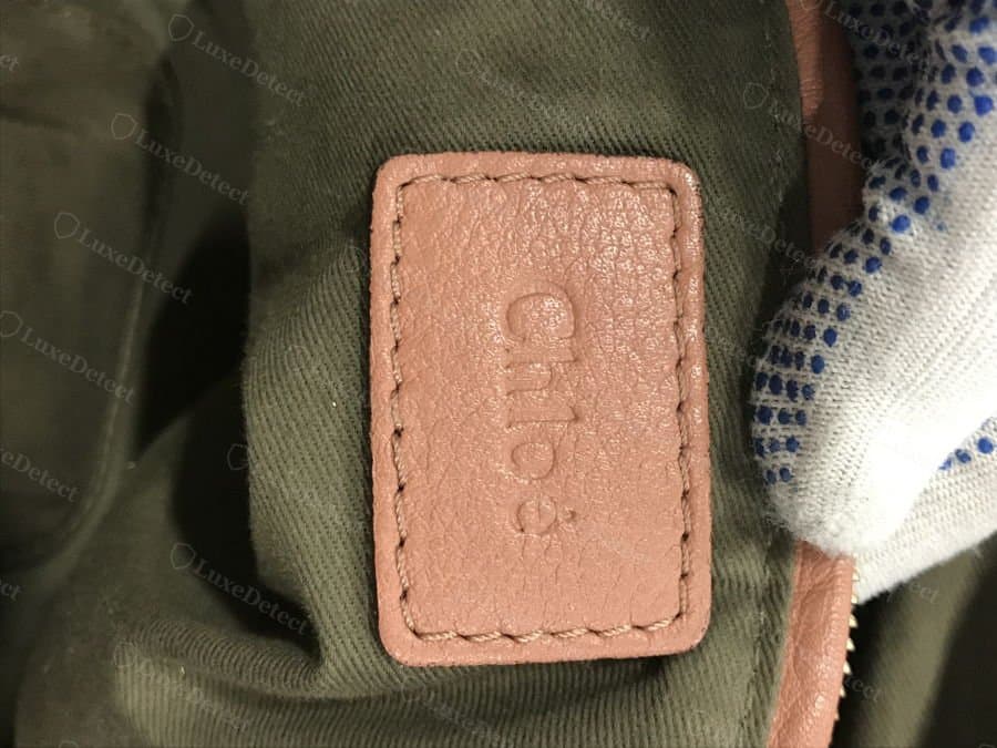 Authentic Chloé interior nameplate — clean embossing, accent sits cleanly over the final e