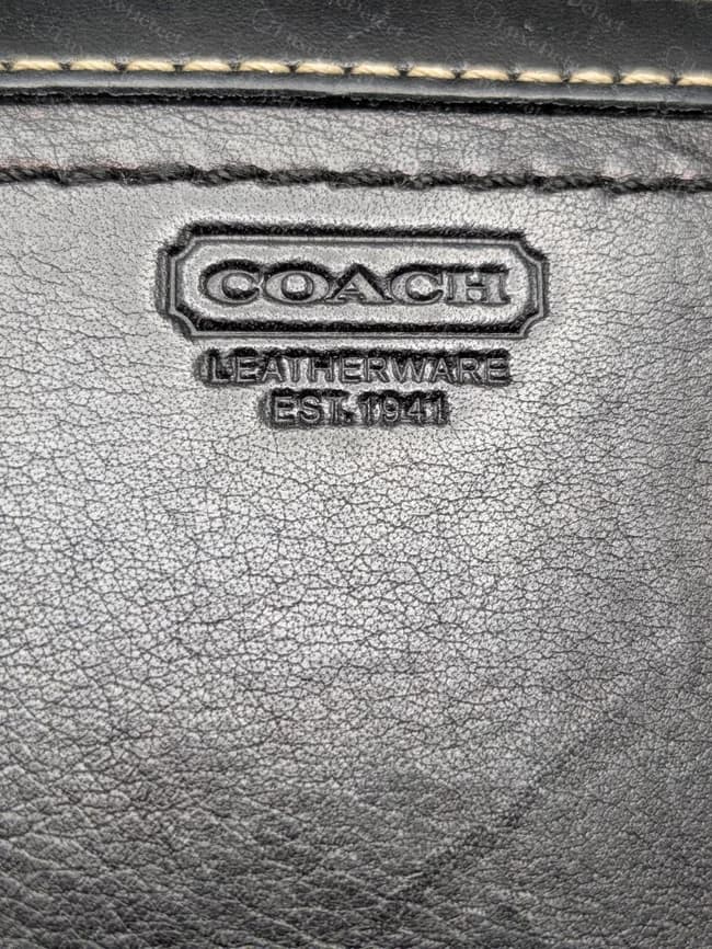 Older Coach wallet (bifold snap): the COACH box with LEATHERWARE and EST. 1941 pressed into the leather, crisp edges