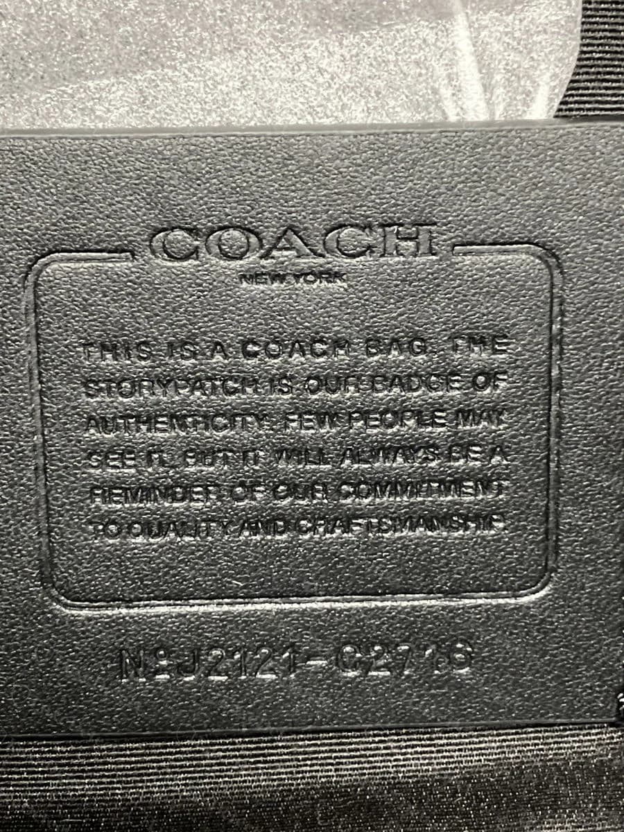A genuine black Coach storypatch reading this is a Coach bag, the storypatch is our badge of authenticity, with a code beginning N°J2121 and a C-number style: September 2021