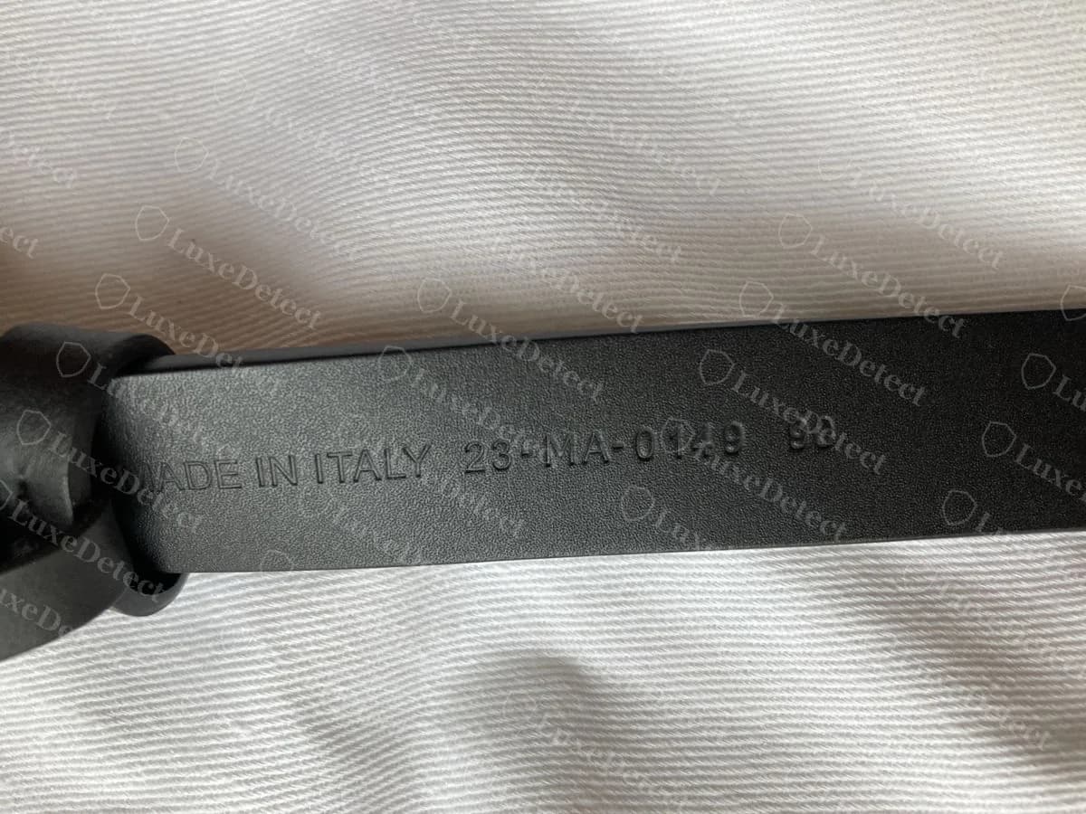 Counterfeit Dior Teddy-D belt, stamped "MADE IN ITALY 23-MA-0149 90", repeating the exact code from the fake CD belt above