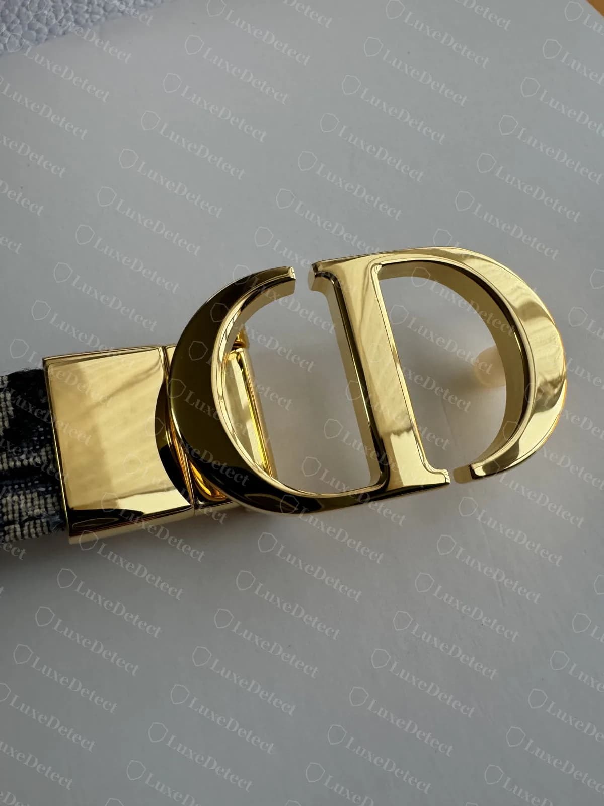 Genuine 30 Montaigne belt, the gold oval CD buckle with crisp, sharp inner corners, flat polished faces and a clean gap between the C and D