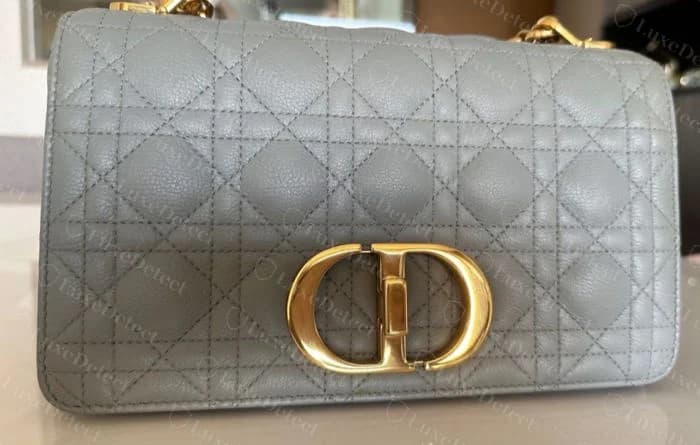 Genuine macrocannage quilting on a Caro flap front, showing the wider diamond scale and fixed CD turn-lock
