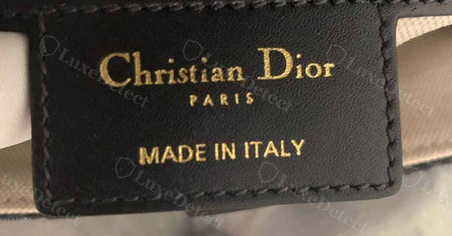 Authentic interior stamp: "Christian Dior PARIS" in gold foil, even letter spacing, "MADE IN ITALY" clean below it