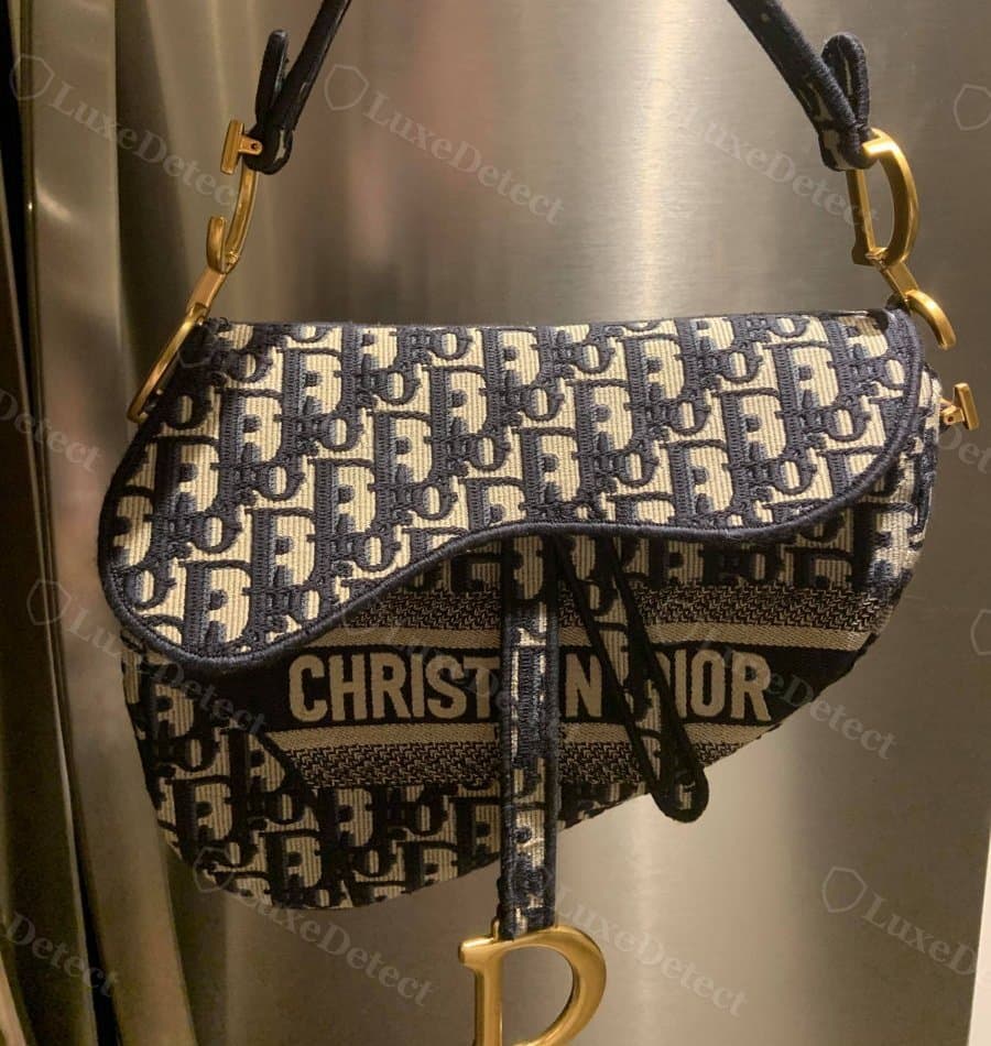 Counterfeit Saddle Bag: a close copy of the curve at a glance, which is why silhouette alone is a starting point, not the whole check