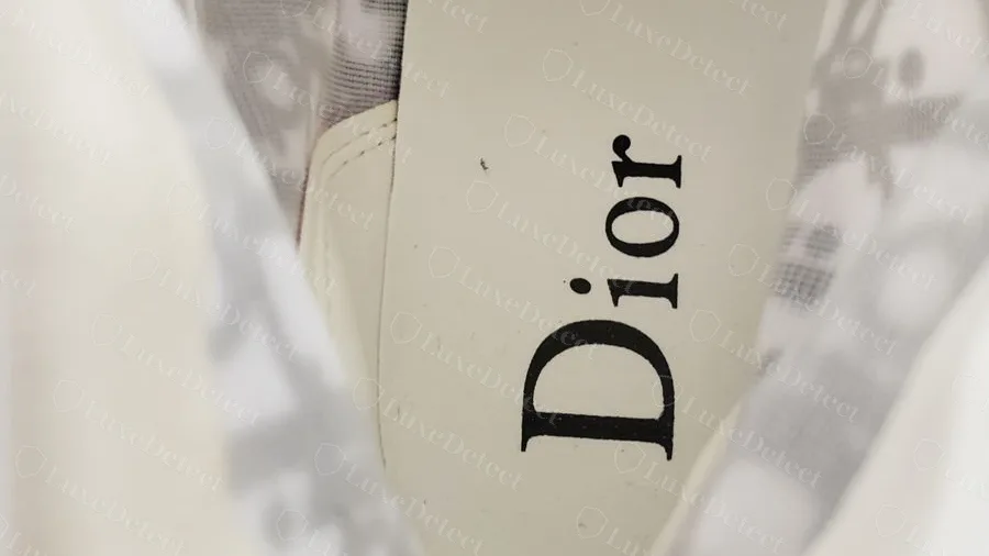 Counterfeit Dior B23 with a mixed-case Dior print on the insole, seen inside the shoe